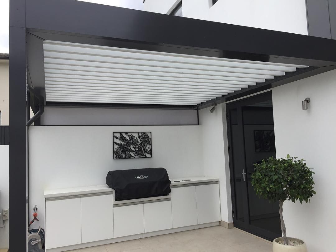 White Outdoor Patio With Black Pergola — Narellan Home Improvement Centre In Southern Highlands, NSW