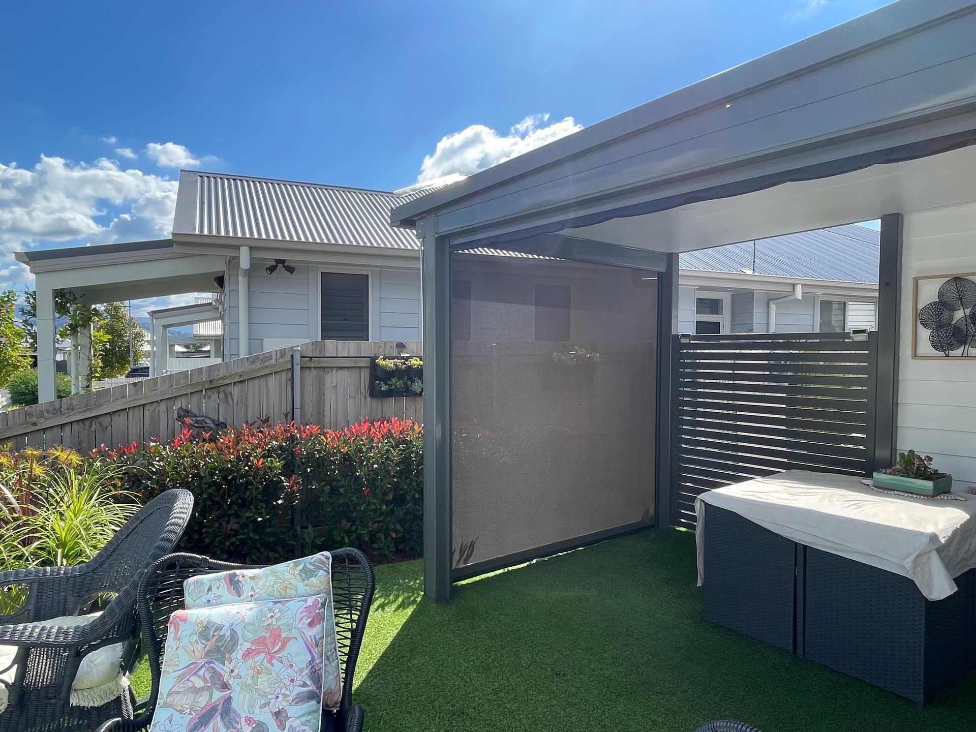 Two-story House With a Balcony With Glass Railing, and a Red-trimmed Roof — Narellan Home Improvement Centre In Narellan, NSW