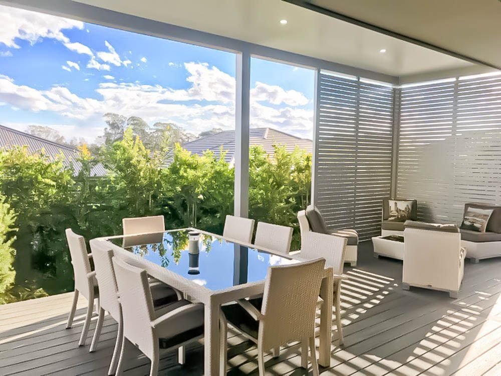 Outdoor Dining Area With Privacy Screens, Table and Chairs — Narellan Home Improvement Centre In Narellan, NSW