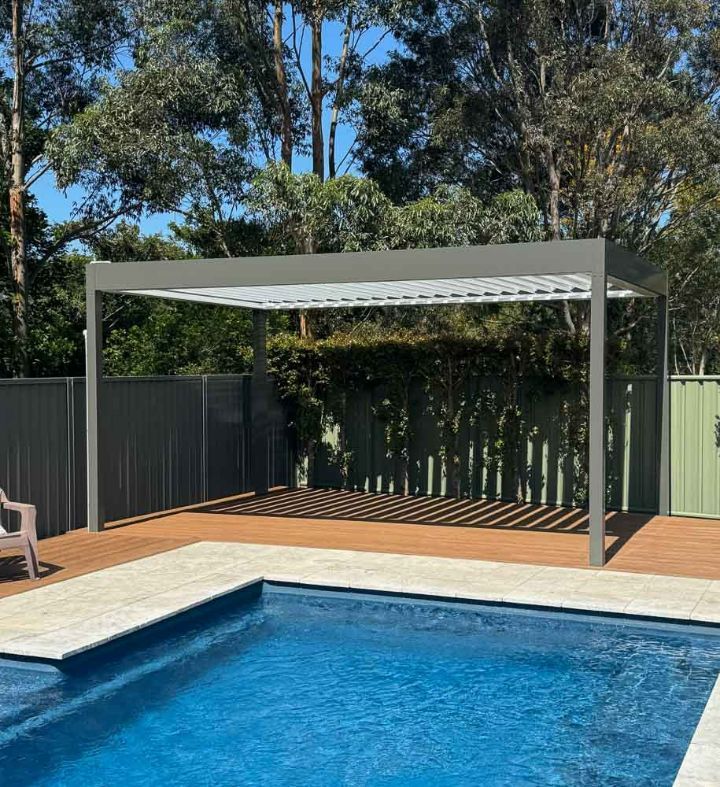 Gray Pergola Over a Pool Deck With a Swimming Pool — Narellan Home Improvement Centre In Narellan, NSW