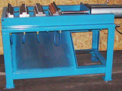 A blue table with a bunch of tools on it