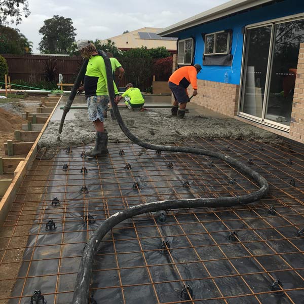 concrete foundation being poured