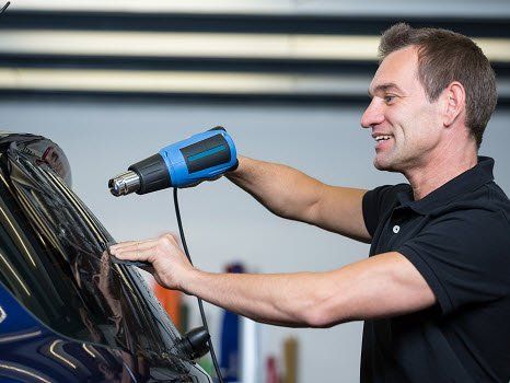 Vehicle window tinting