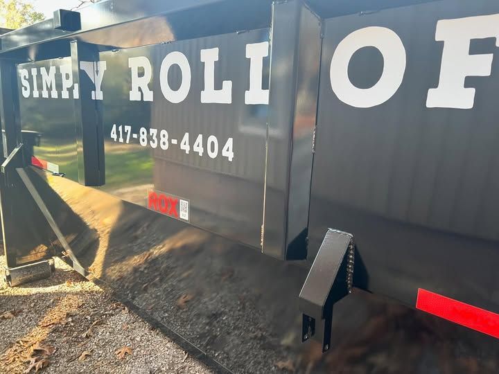 Black roll-off dumpster with 
