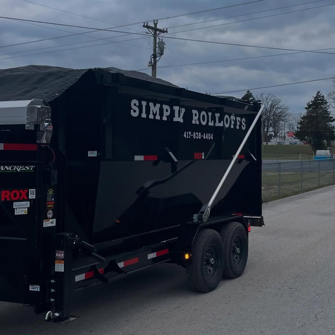 A dumpster with the word simpl rolloffs on it