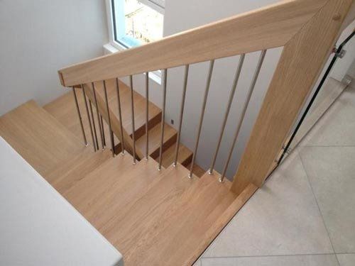 scale artigianali in legno con ringhiera e passamano in legno