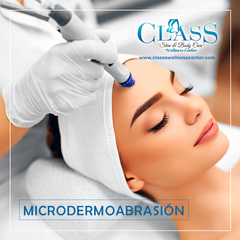 A woman is getting a microdermabrasion treatment at class