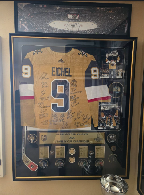 Framed hockey jersey signed