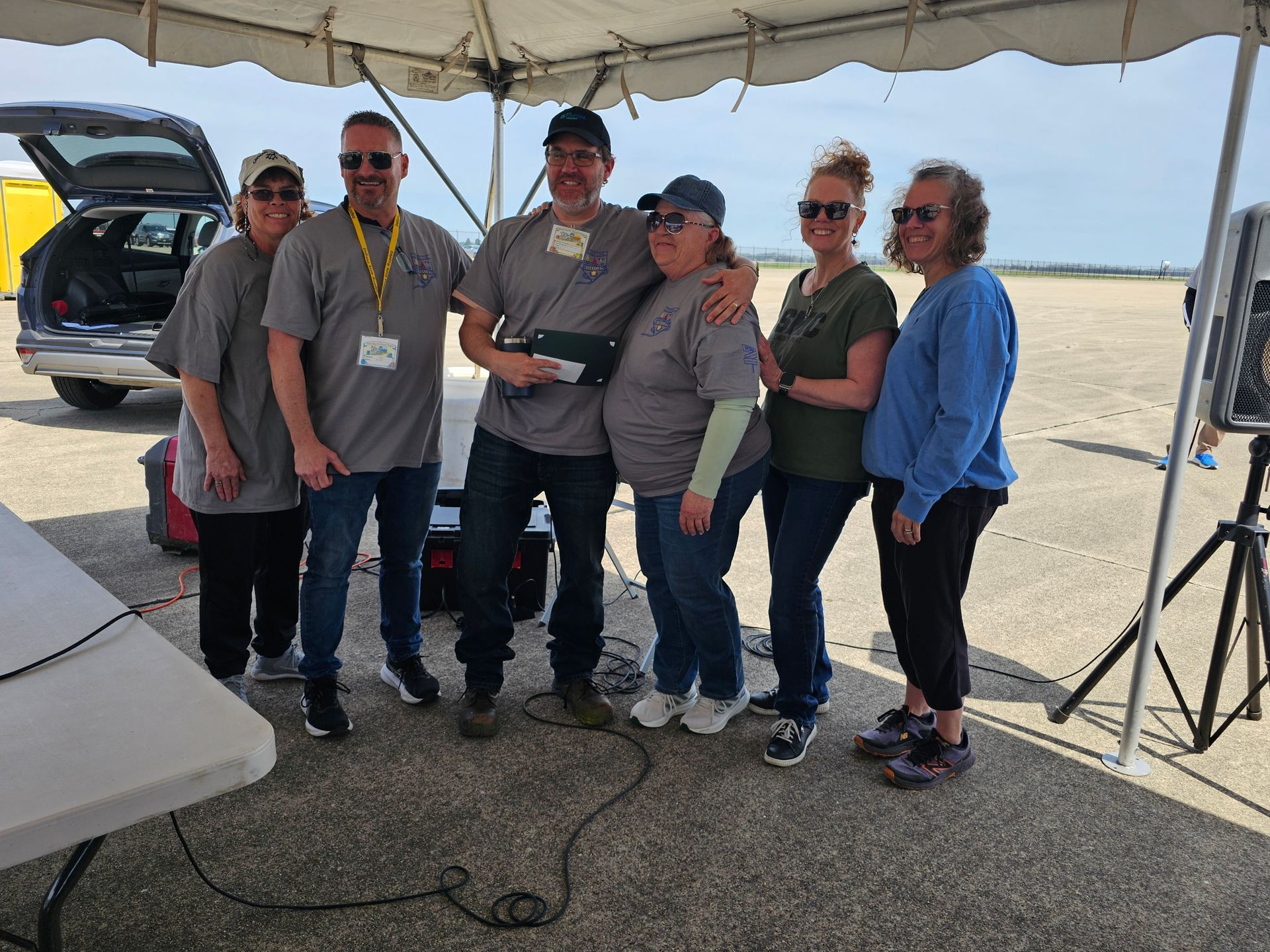 photo of: Vicky Warner, RTAP/RLS, Marty Blake, INDOT Division Chief, Dereck Jonson, Columbus Transit Roadeo winner, Kathy Lee, Columbus Transit, and BethAnn Knotts, Compliance Manager, Columbus Transit. 