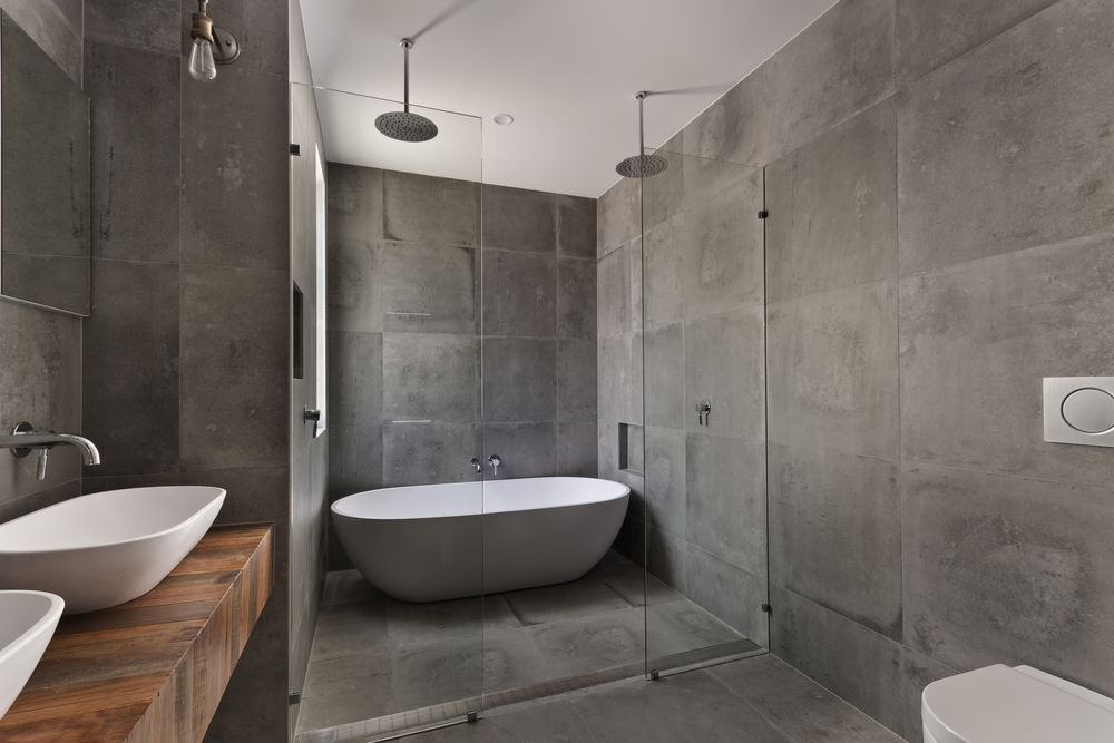 A Modern Bathroom with Gray Tile Walls — Downs Window Renewals in Harristown, QLD.