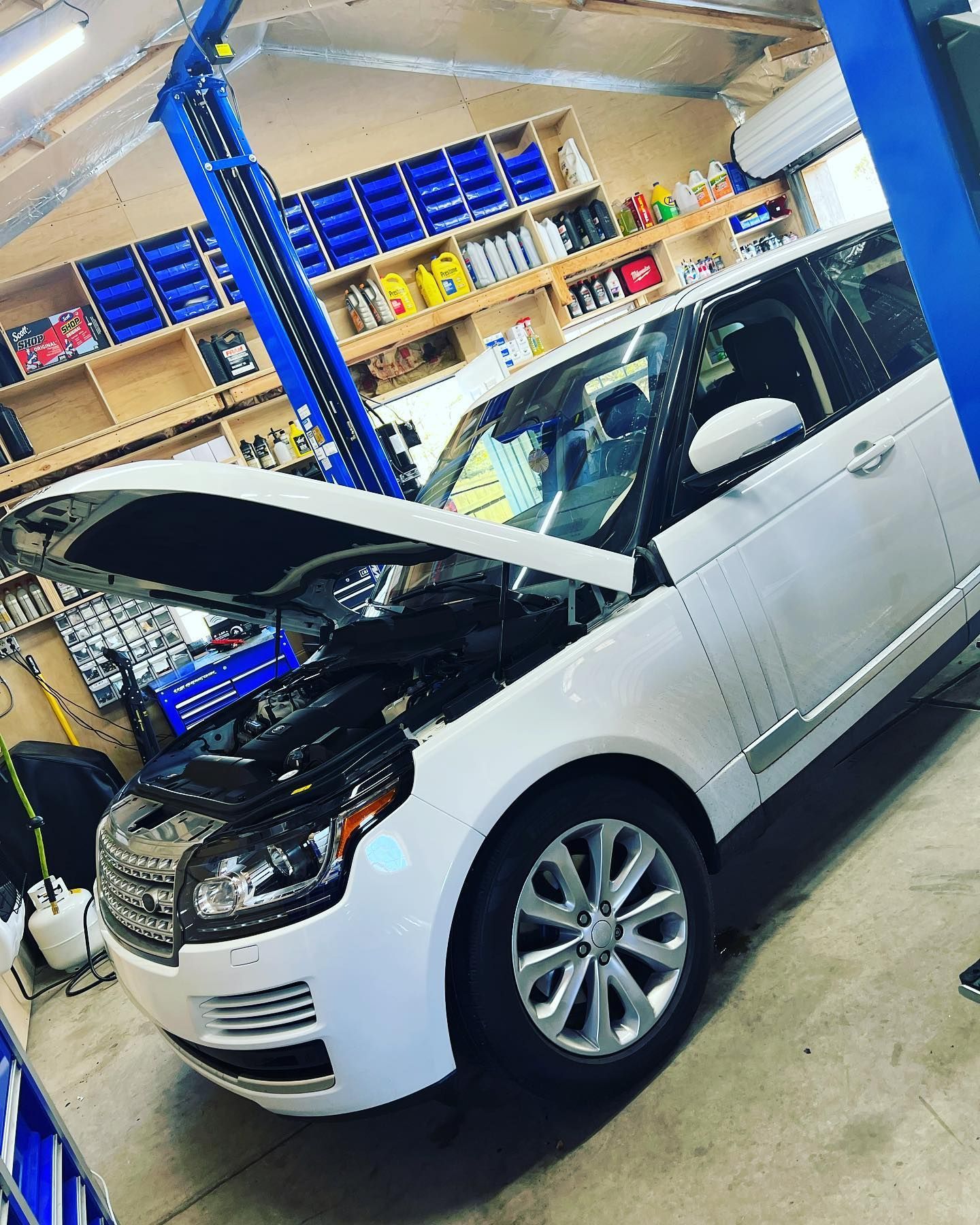 White SUV With Hood Open | PDub’s Garage LLC