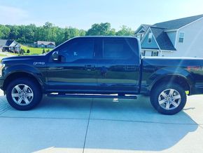 Black Pickup Truck Parked Outdoors | PDub’s Garage LLC
