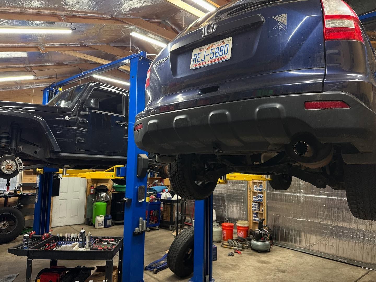 Vehicle Lifted for Undercar Inspection | PDub’s Garage LLC