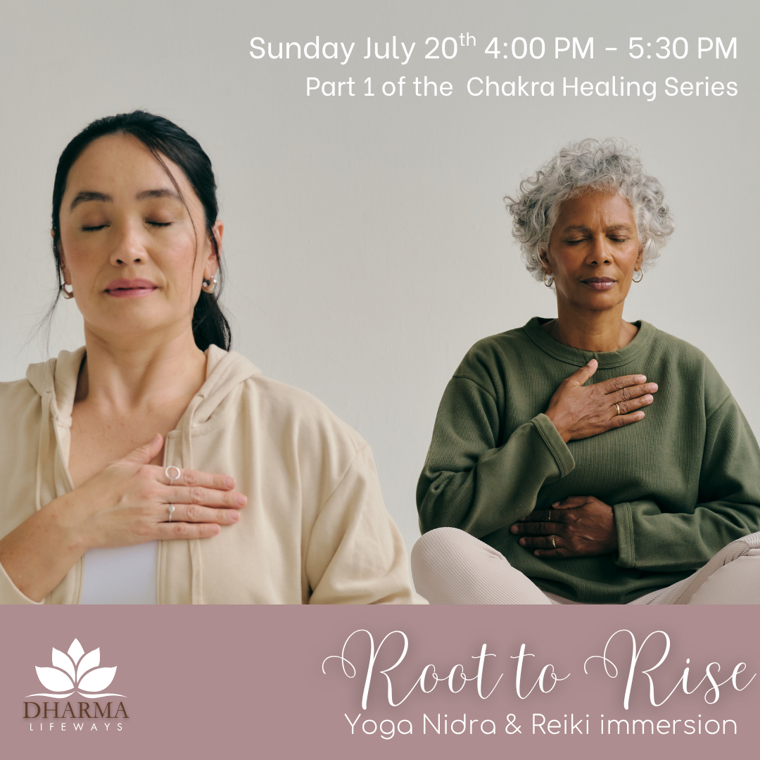 Two women are sitting in a lotus position with their hands on their chests.