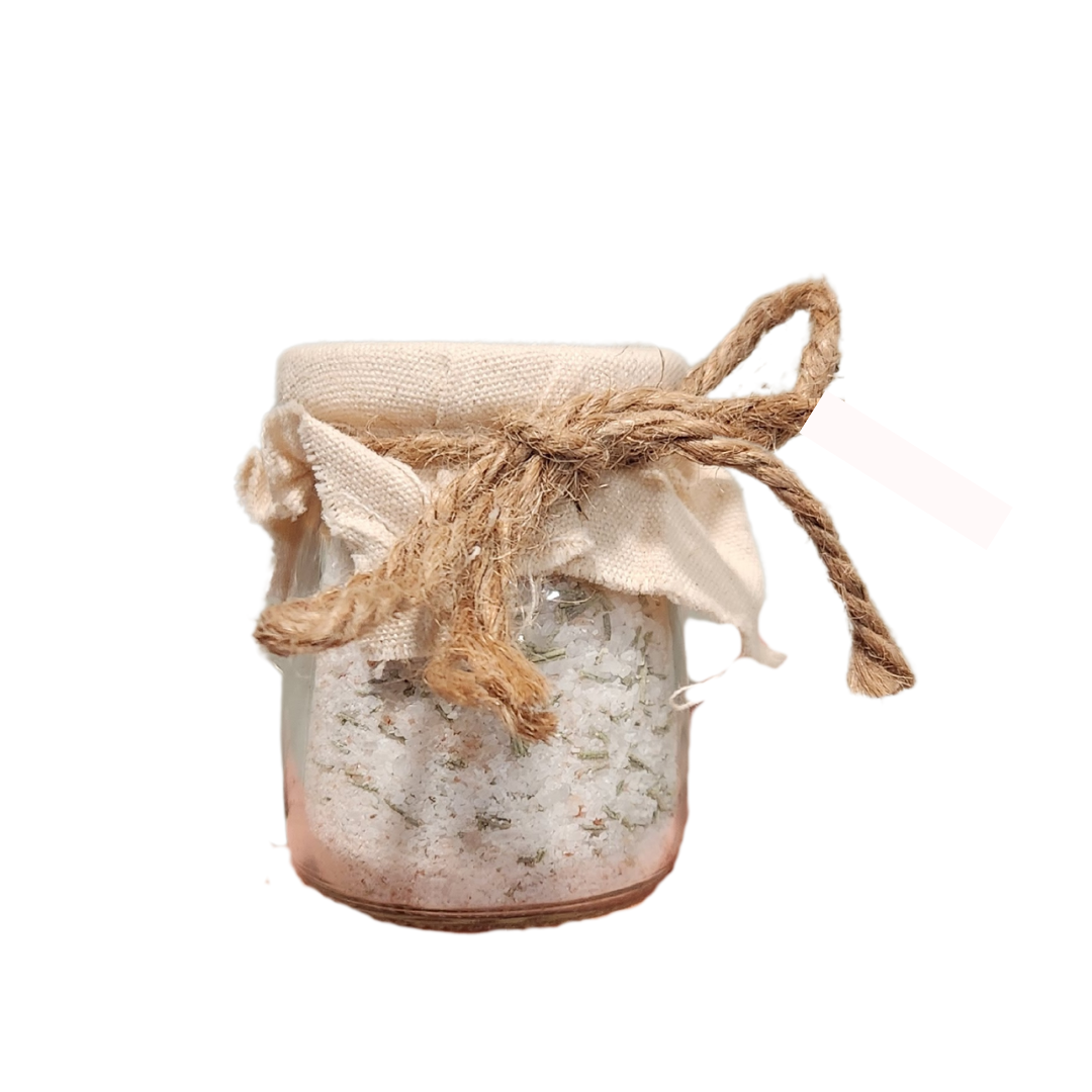 A jar of salt with a rope tied around it on a white background.