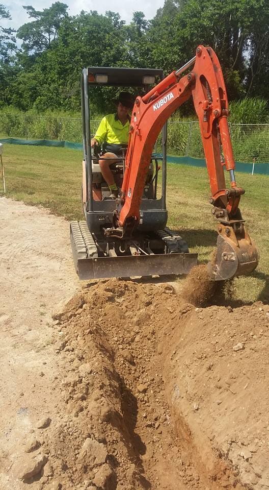Excavator On Road — Absolute Dingo Services in White Rock, QLD