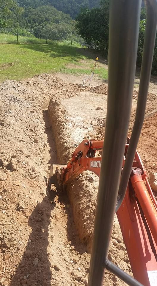 Trench Digging With Excavator — Absolute Dingo Services in White Rock, QLD