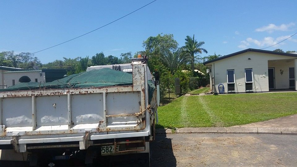 A Dump Truck With A Covered Load — Absolute Dingo Services in White Rock, QLD