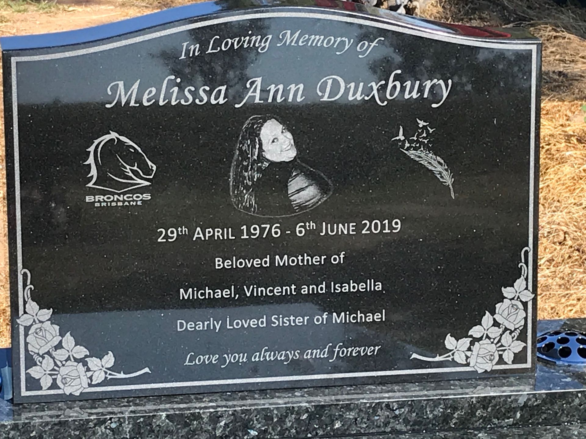 A gravestone for melissa ann duxbury is in loving memory