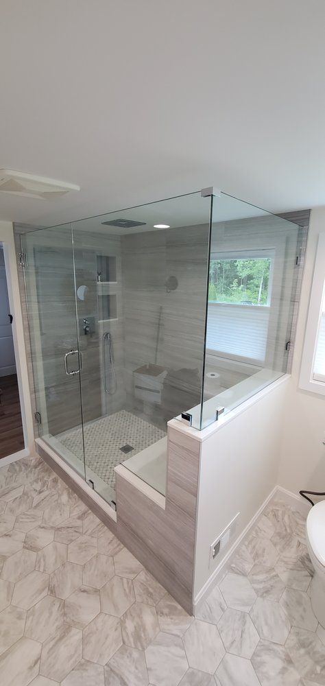 Large glass shower in bathroom