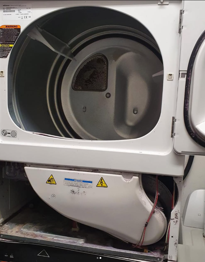 A white washer and dryer with the door open