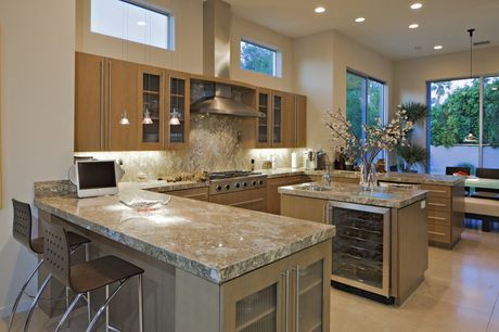 kitchen with countertop and chairs