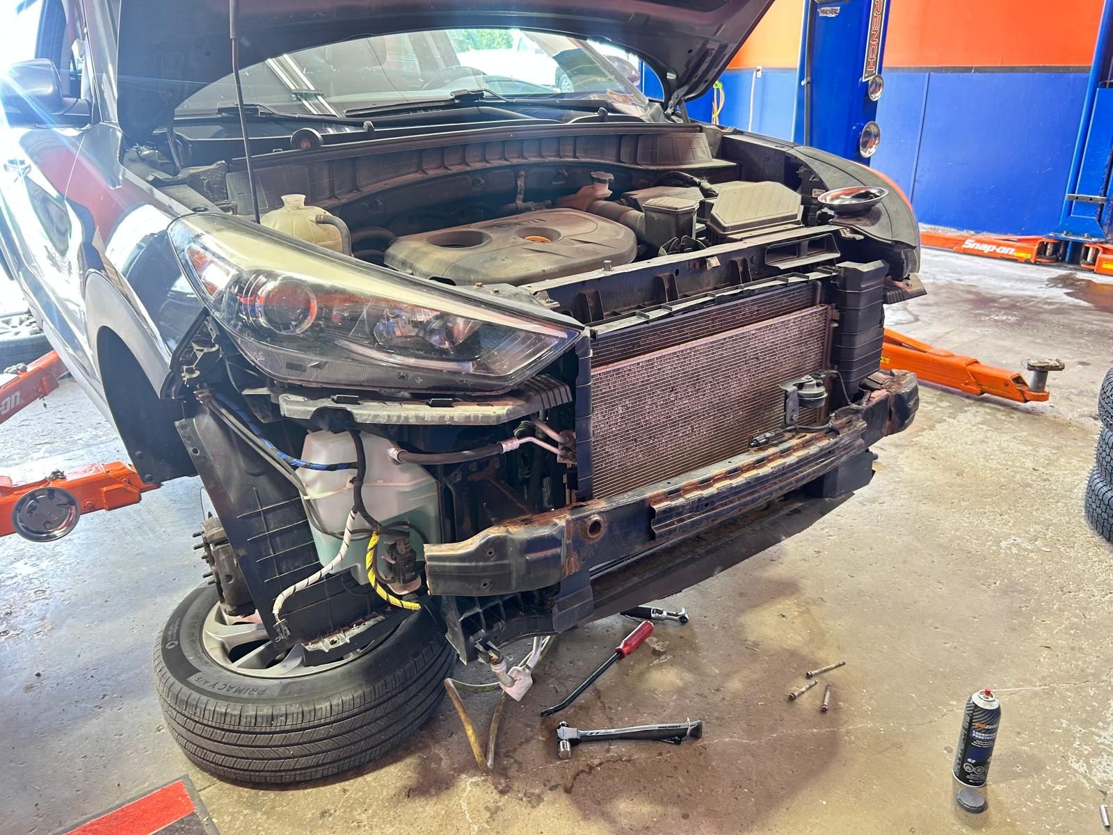 SUV With Front Bumper Removed During Repair | North Automotive Group