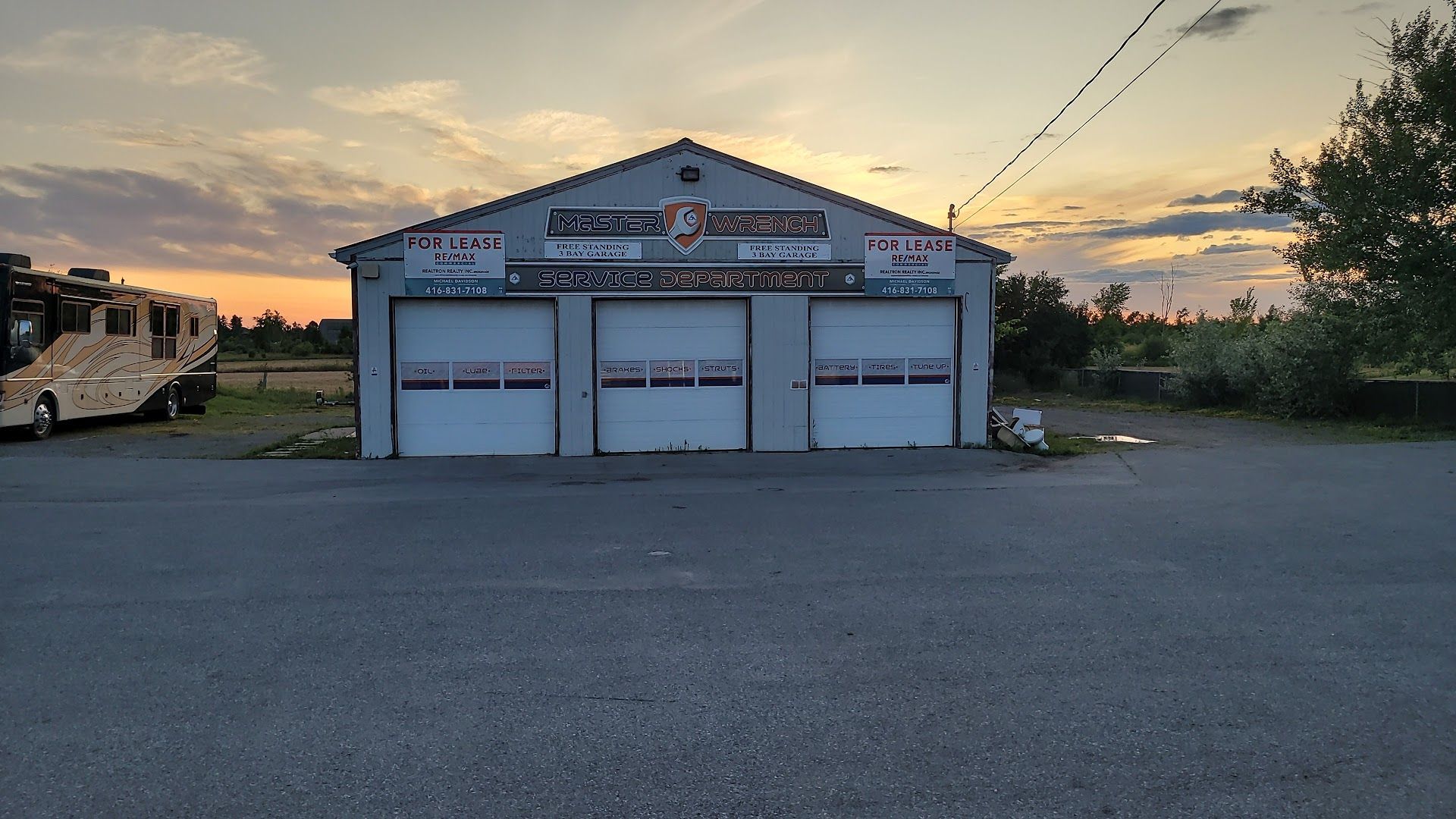 Auto Repair Shop Exterior at Dusk | North Automotive Group
