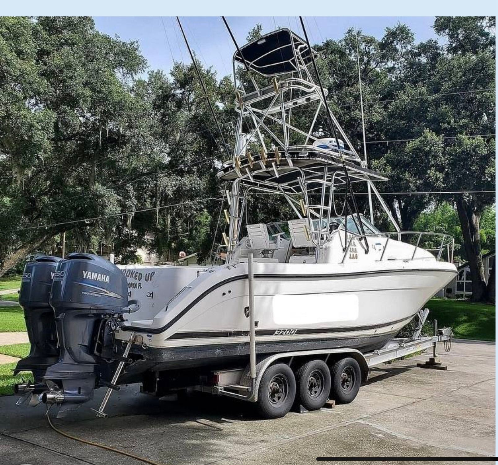 A yamaha boat is parked on a trailer