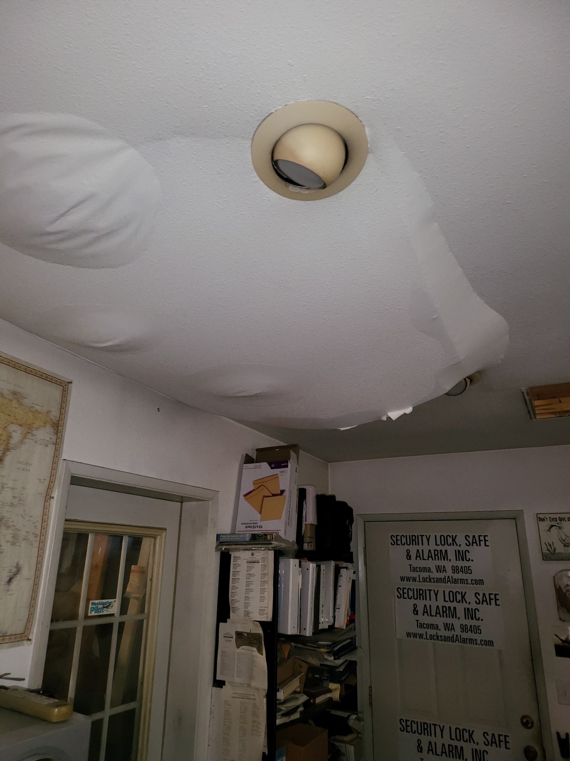 A room with a ceiling that has a pillow on it