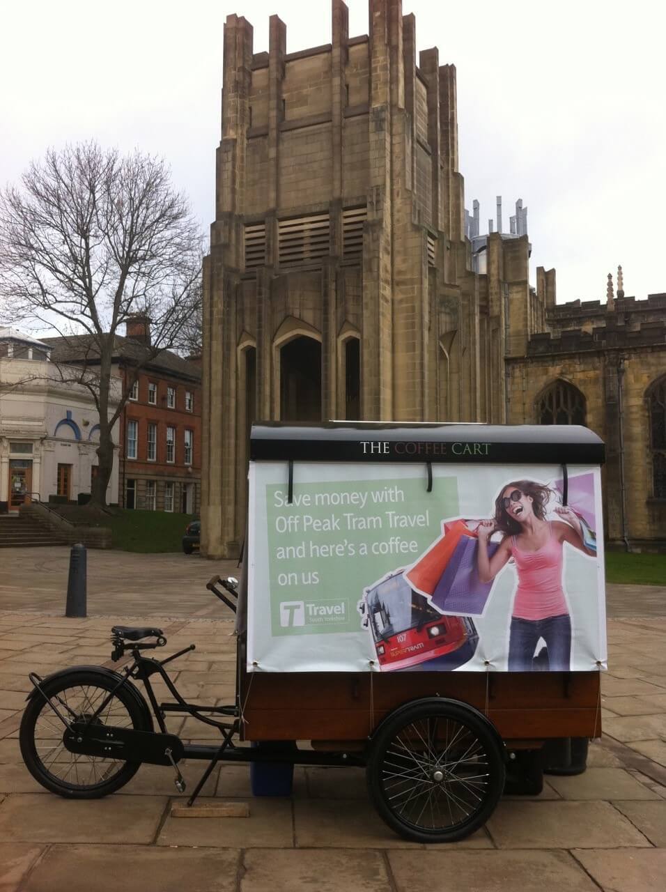 the coffee cart in front of a cathedral