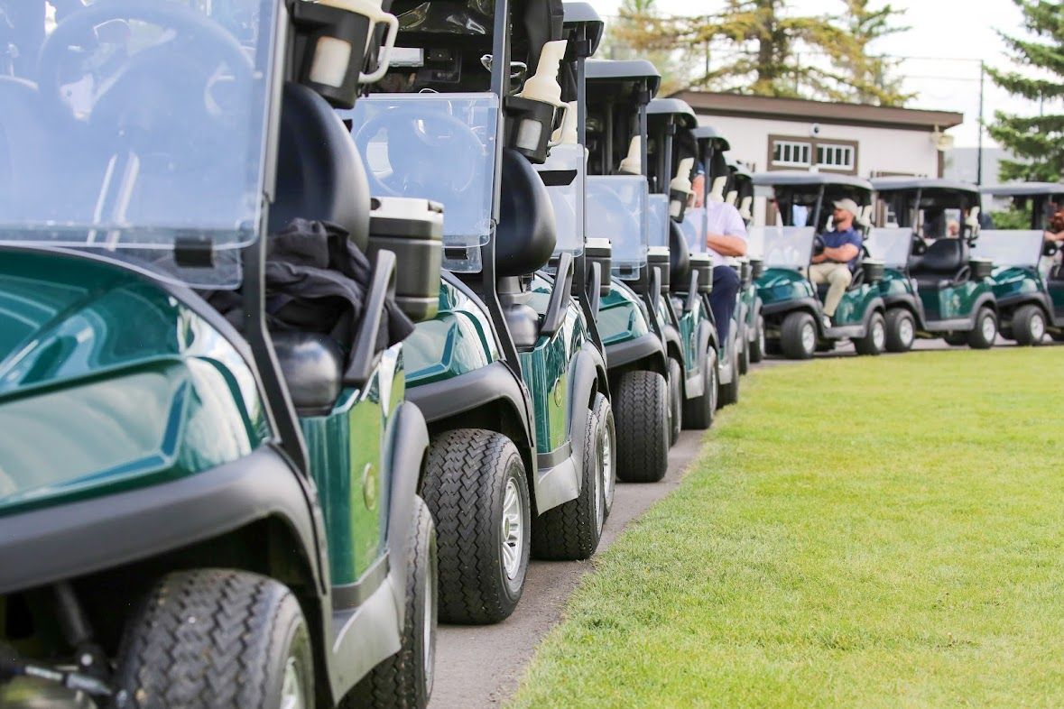 Advertisement: black and white with golf club grips, callaway logo, 