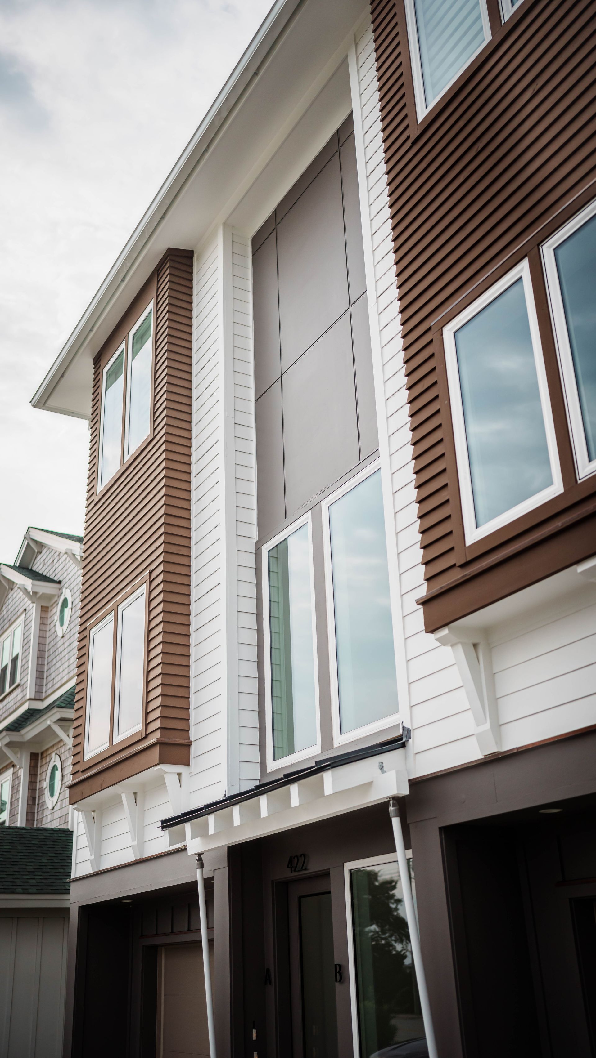 A building with a lot of windows is under construction