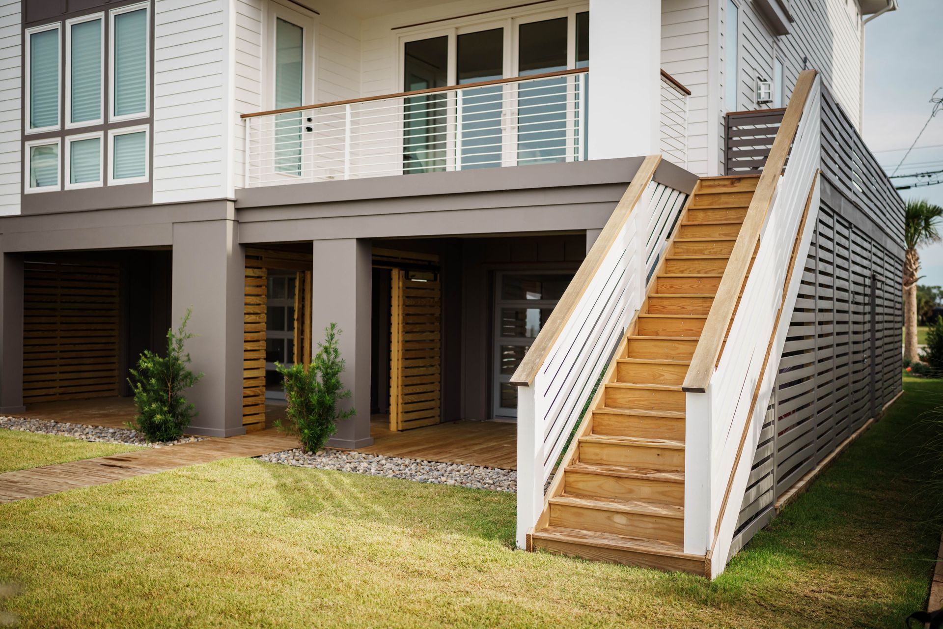 A house with stairs leading up to the second floor