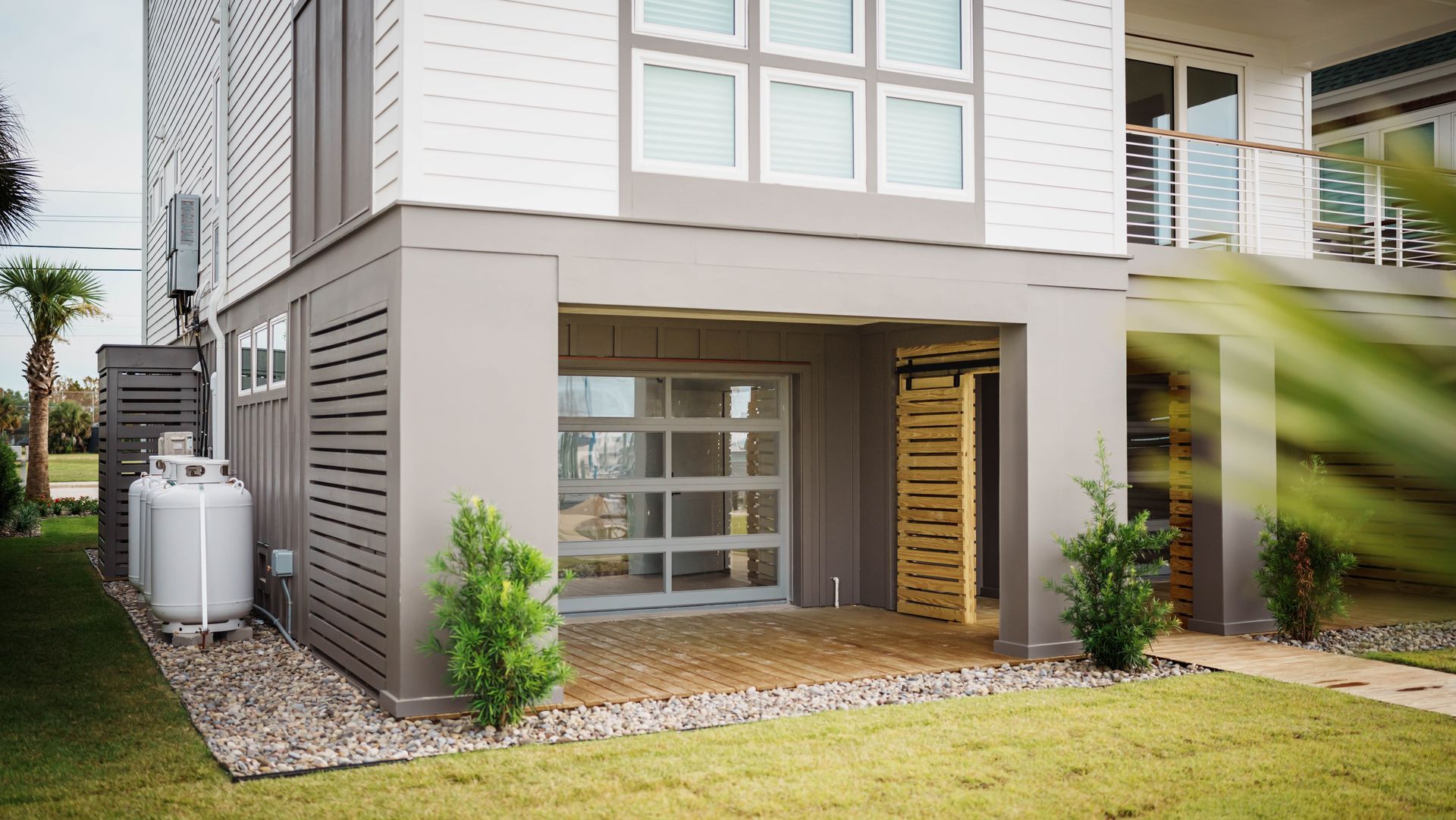 A house with a propane tank in front of it