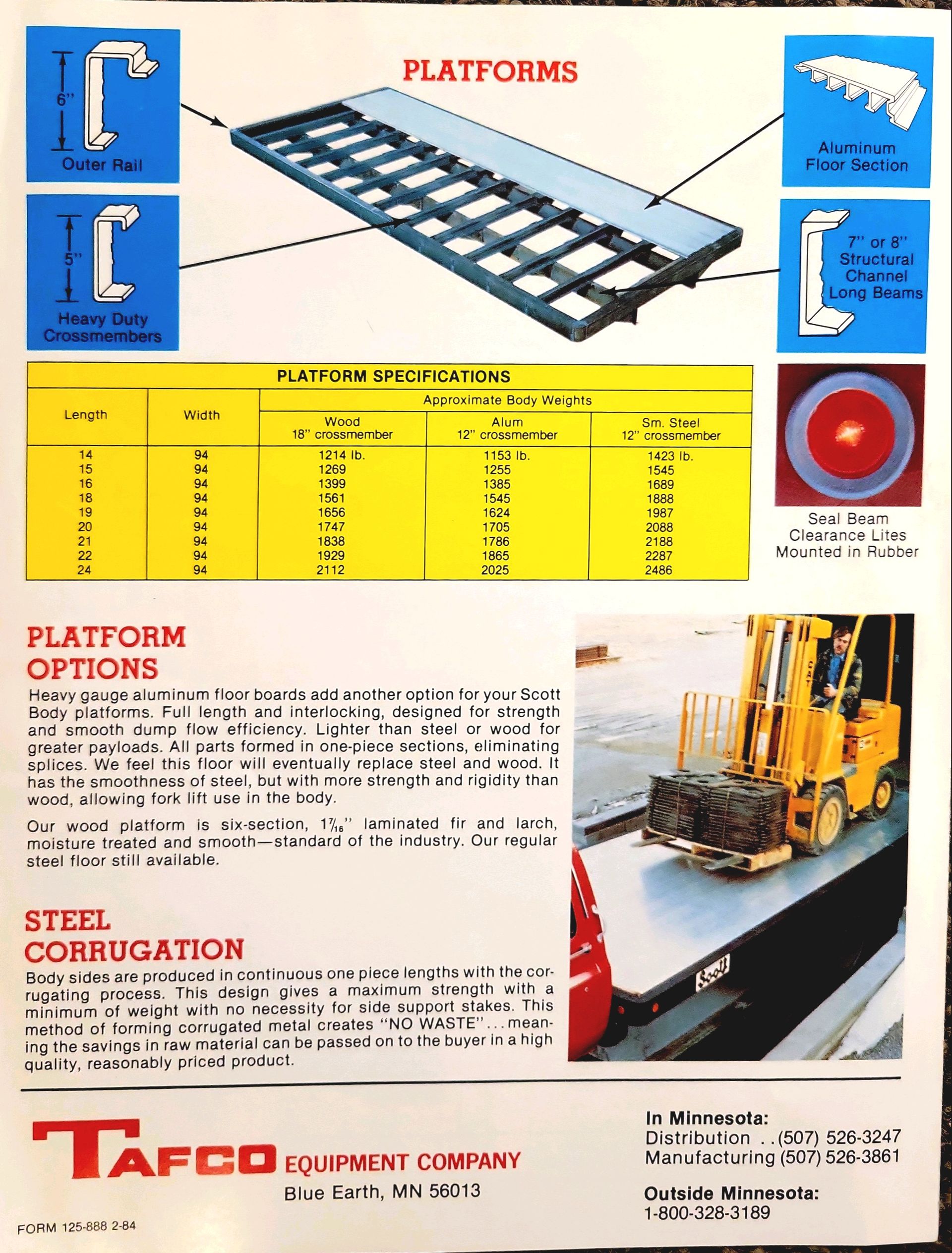 A yellow forklift is sitting on top of a yellow platform