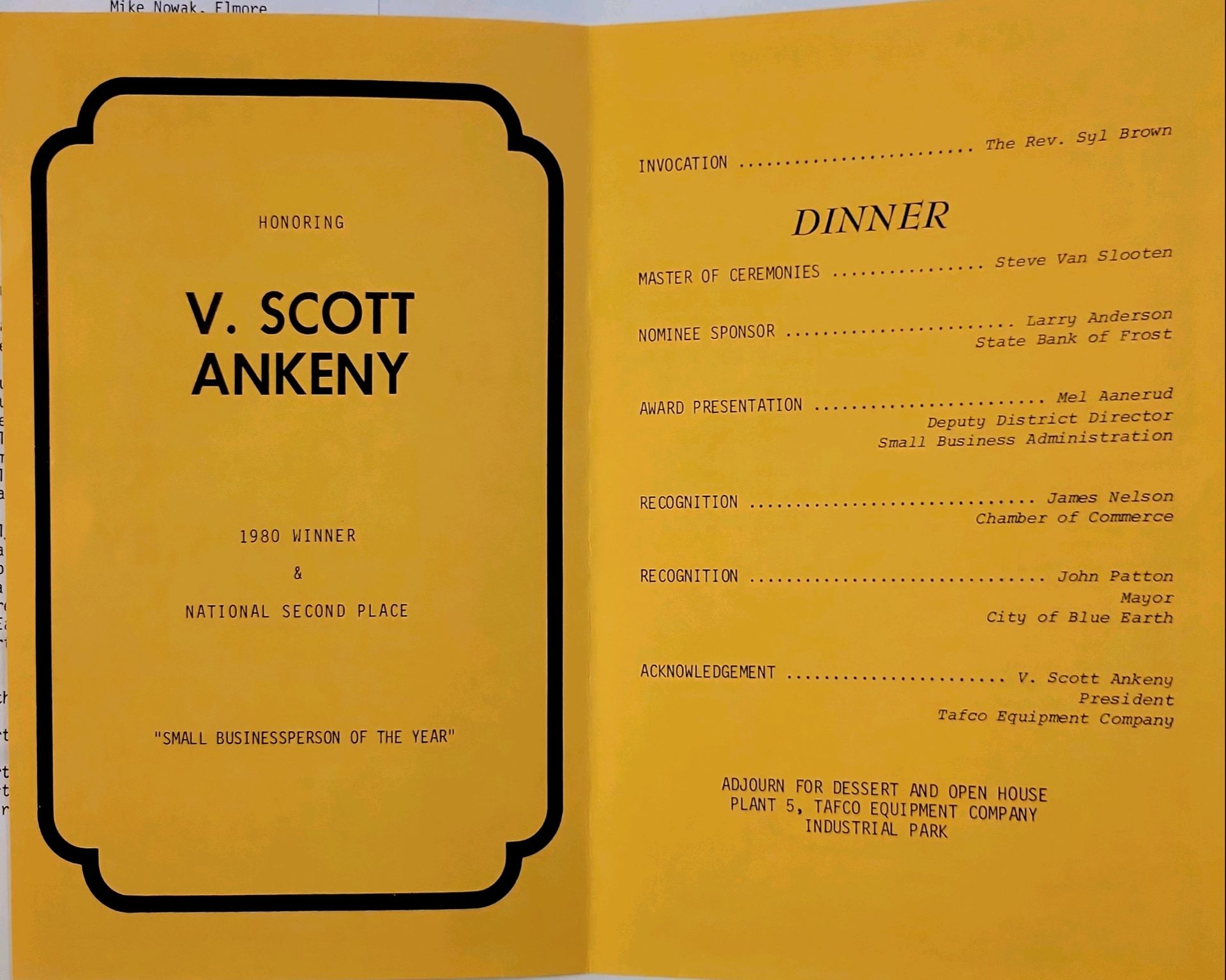 A yellow book is open to a page that says v. scott ankeny