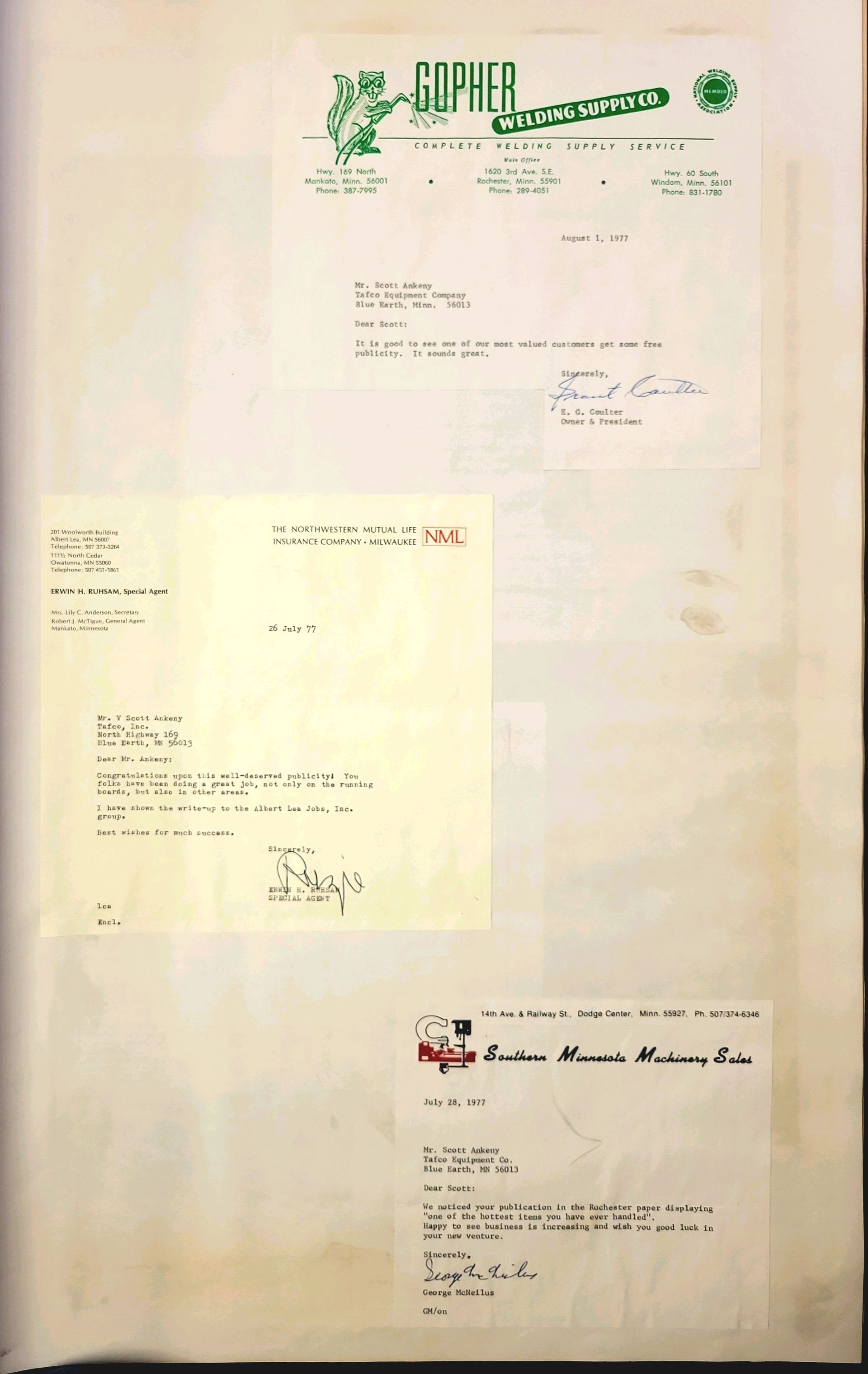 A book with a lot of letters and papers on it