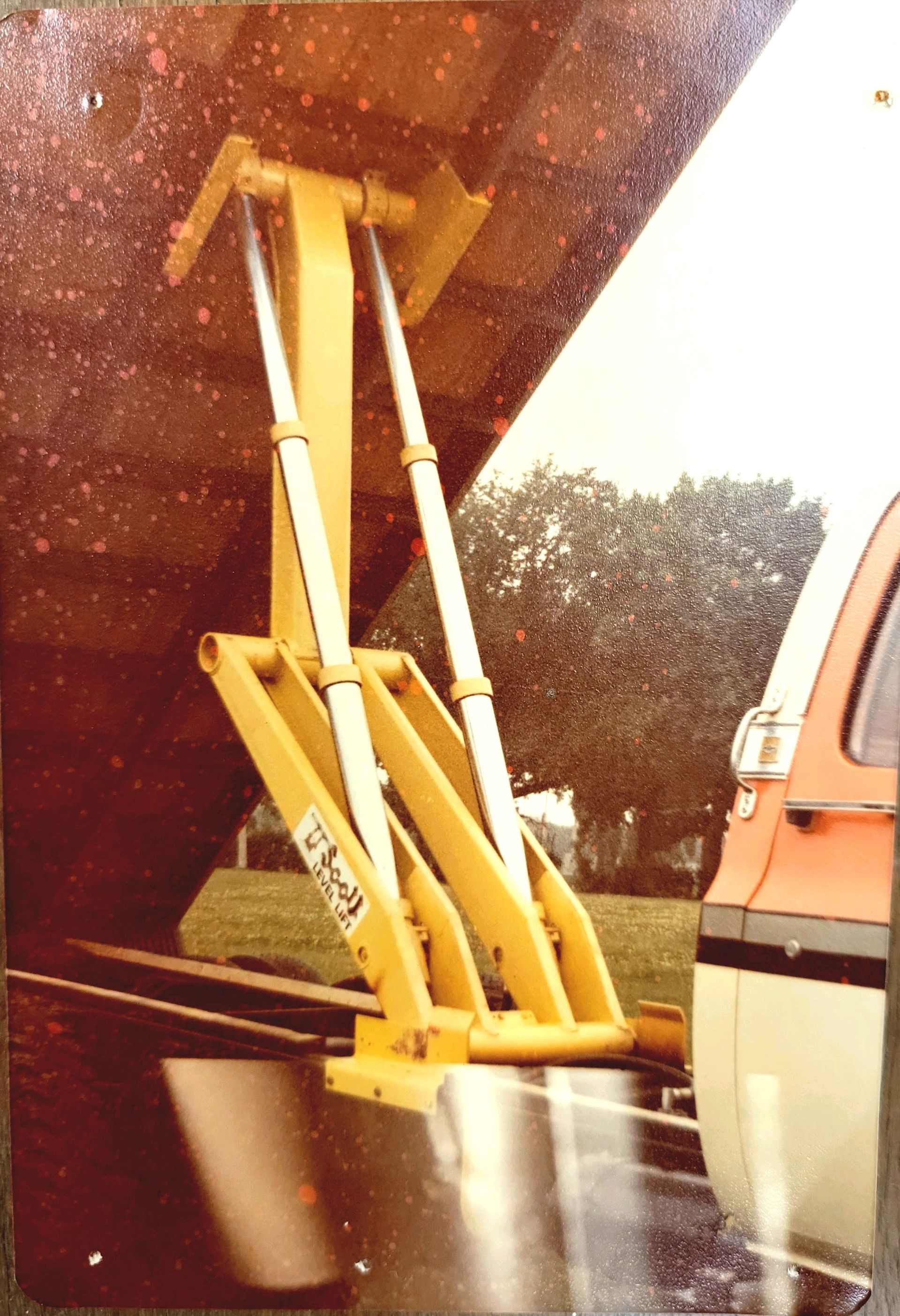 A picture of a vehicle with a yellow item that says excel on it