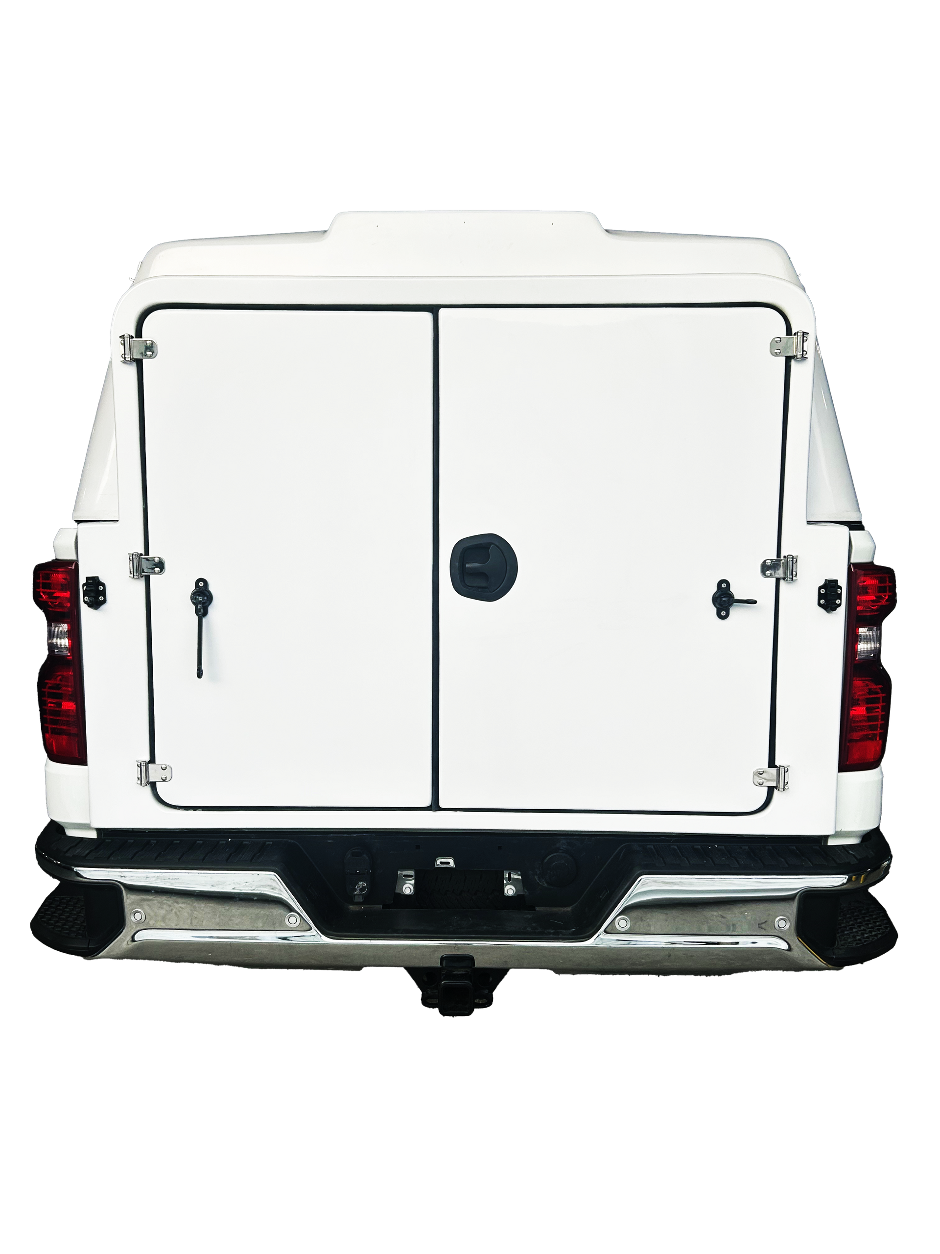The back of a white truck with a canopy and two doors.