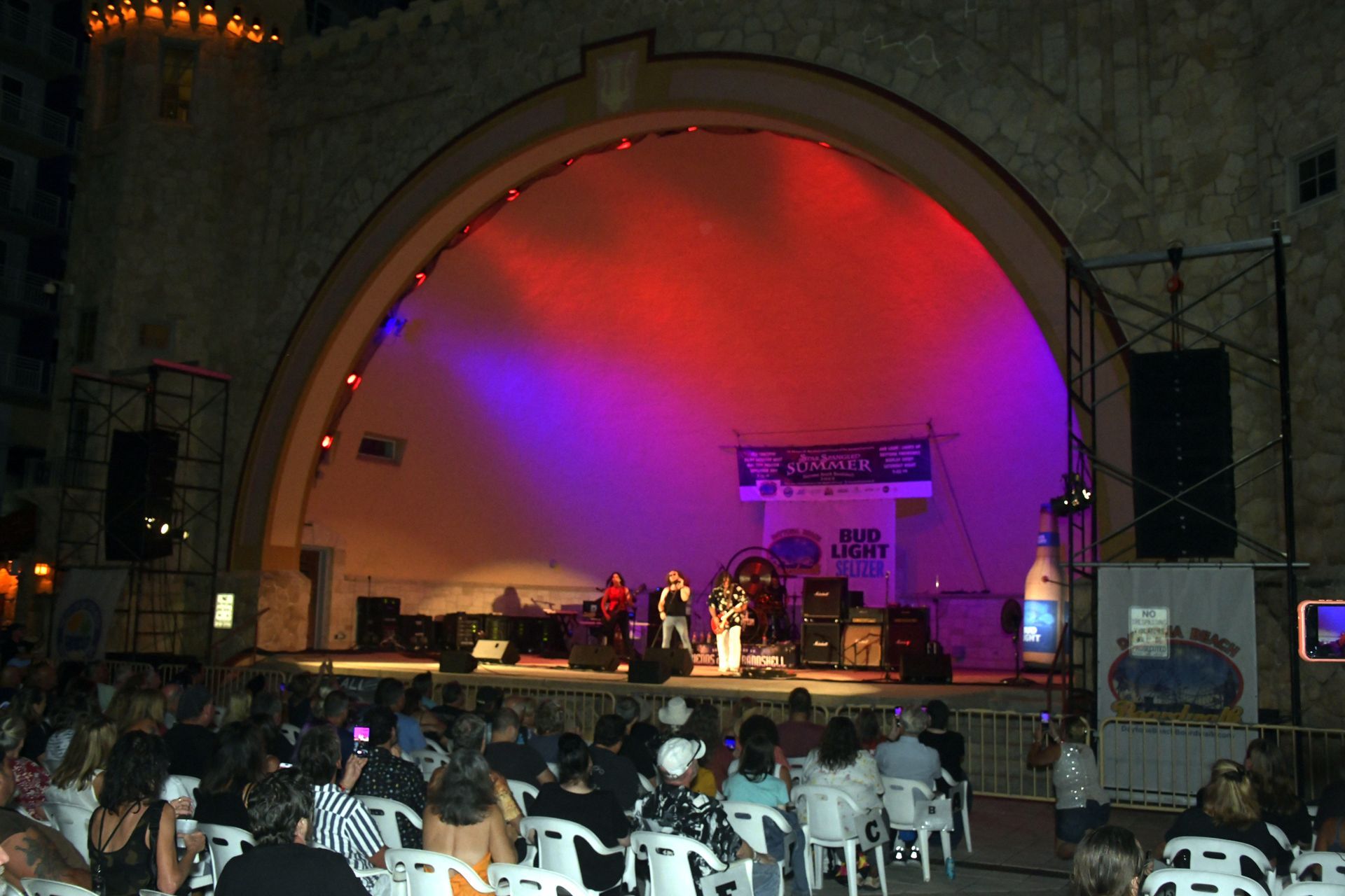 A stage with a sign that says aqua on it