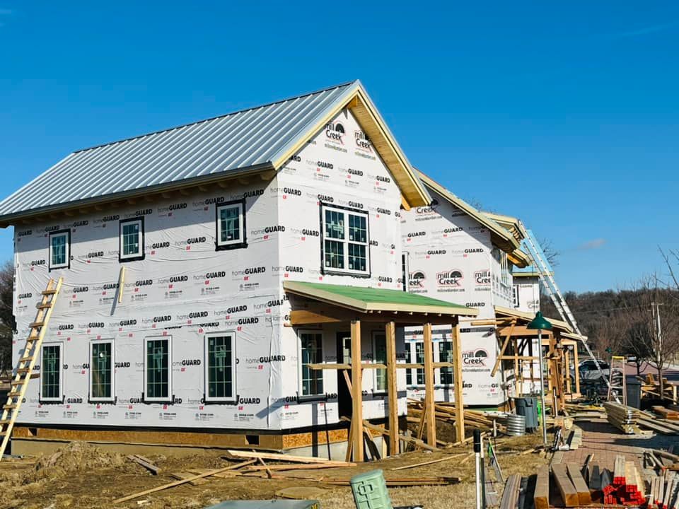 A house that is being built with a metal roof
