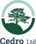 Logo: A green tree silhouette on a rocky outcrop within a two-toned green circle. The text 