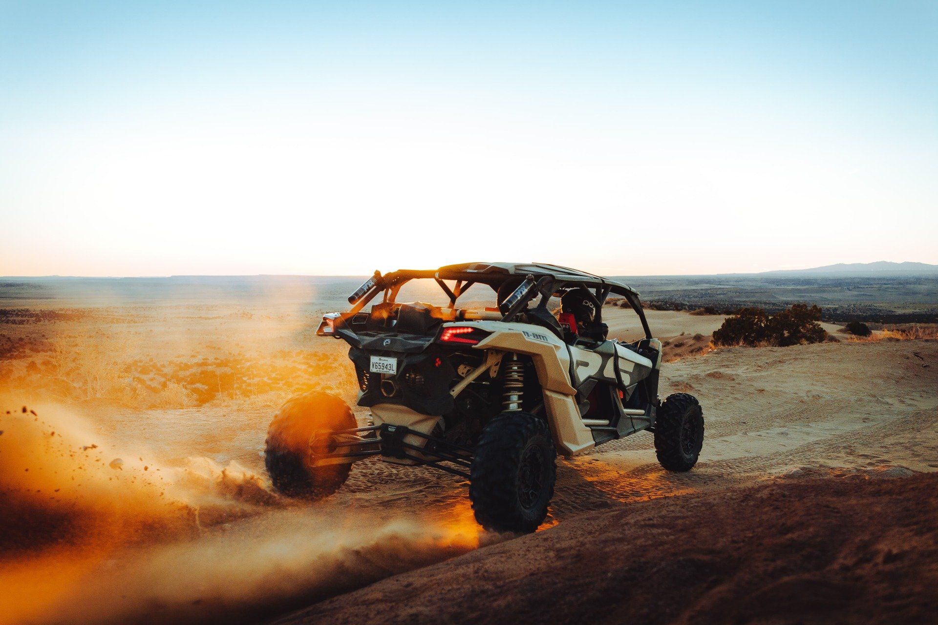 Back view of ATV on a sunset