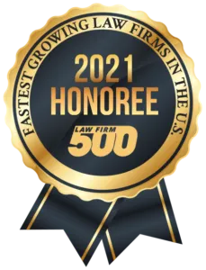 A badge that says 2021 honoree law firm 500