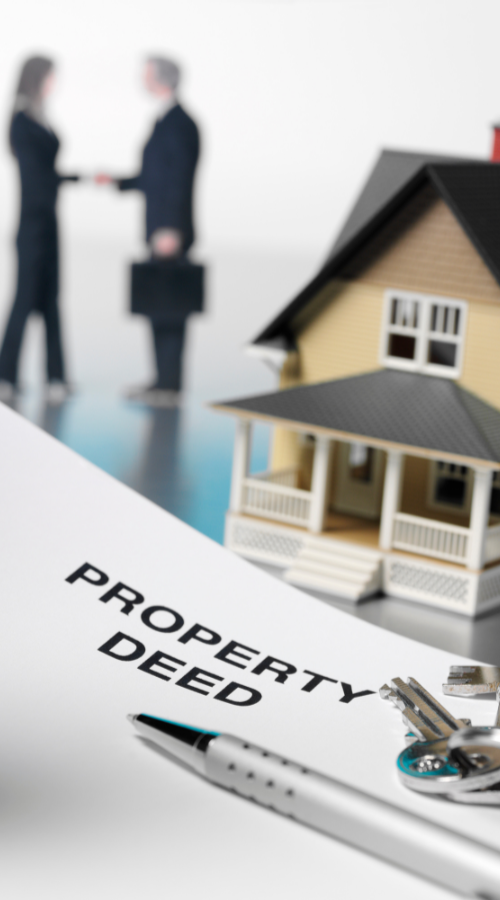 Property Deed Paperwork and house