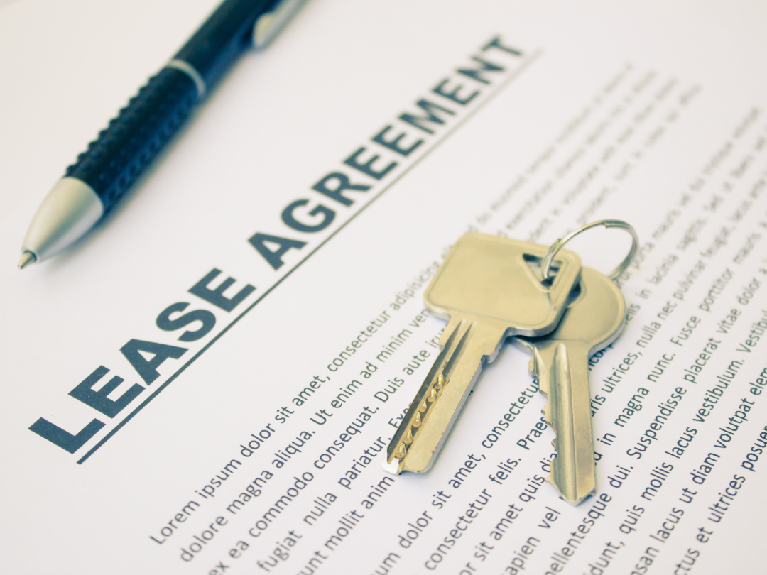 Keys laying on top of Lease Agreement