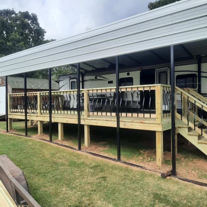 A trailer with a wooden deck and stairs