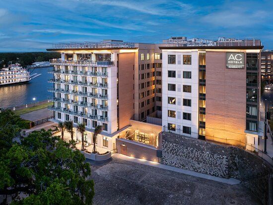 AC Hotel Savannah Historic District River Street Lavender rooftop bar Savannah River views opened April 2025