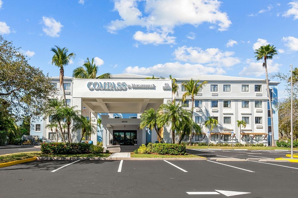 Compass by Margaritaville boutique hotel with full kitchen rooms in Naples Florida